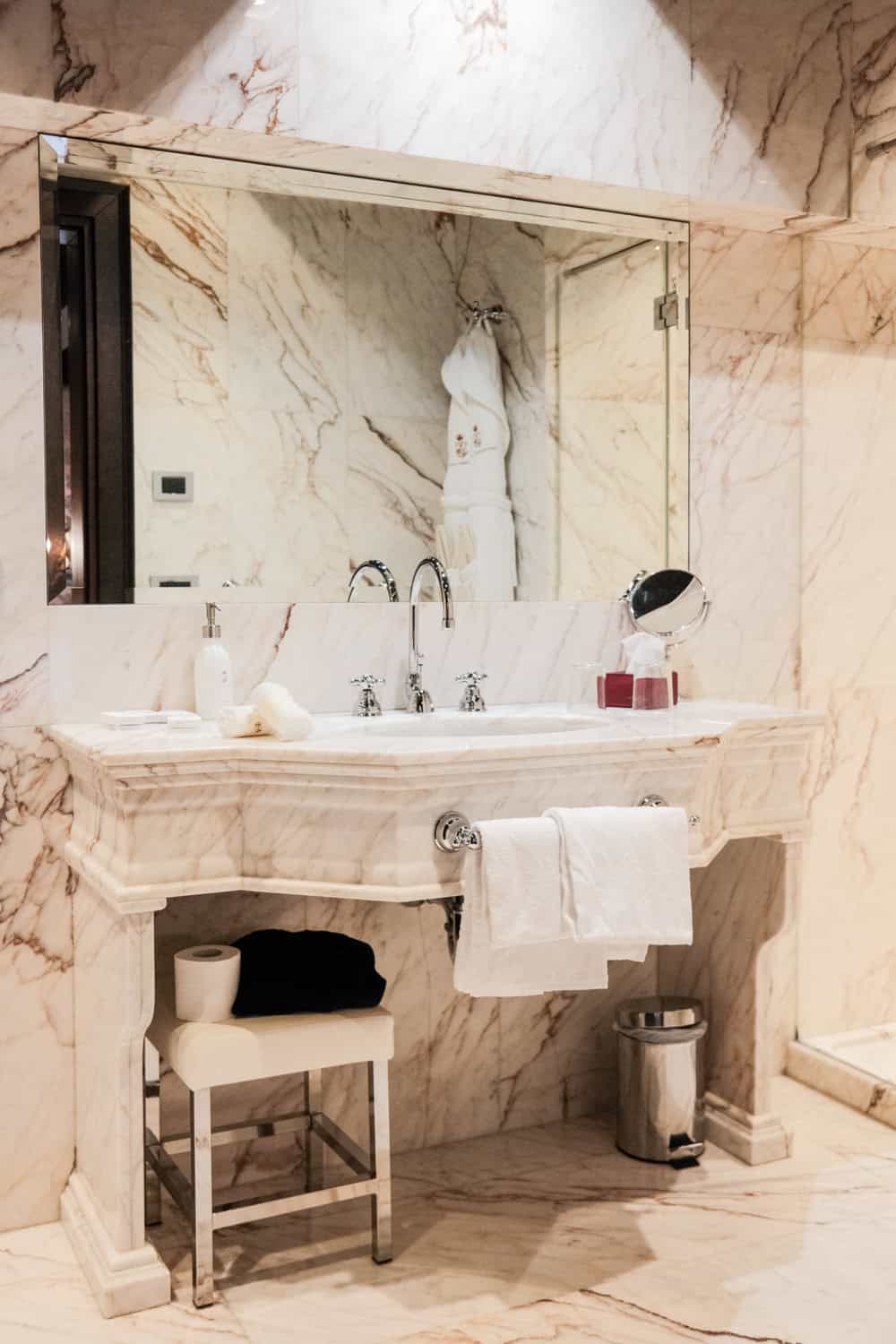 The bathroom with marble walls